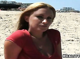 Arresting blonde girl with beautiful face Jayla was resting at the beach when I met her